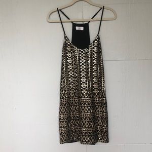Gold and black sequin dress